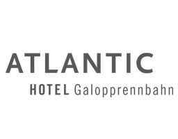 Atlantic Hotel Logo mit Schriftzug "Atlantic Hotel Galopprennbahn" in grauer Schrift auf weißem Hintergrund